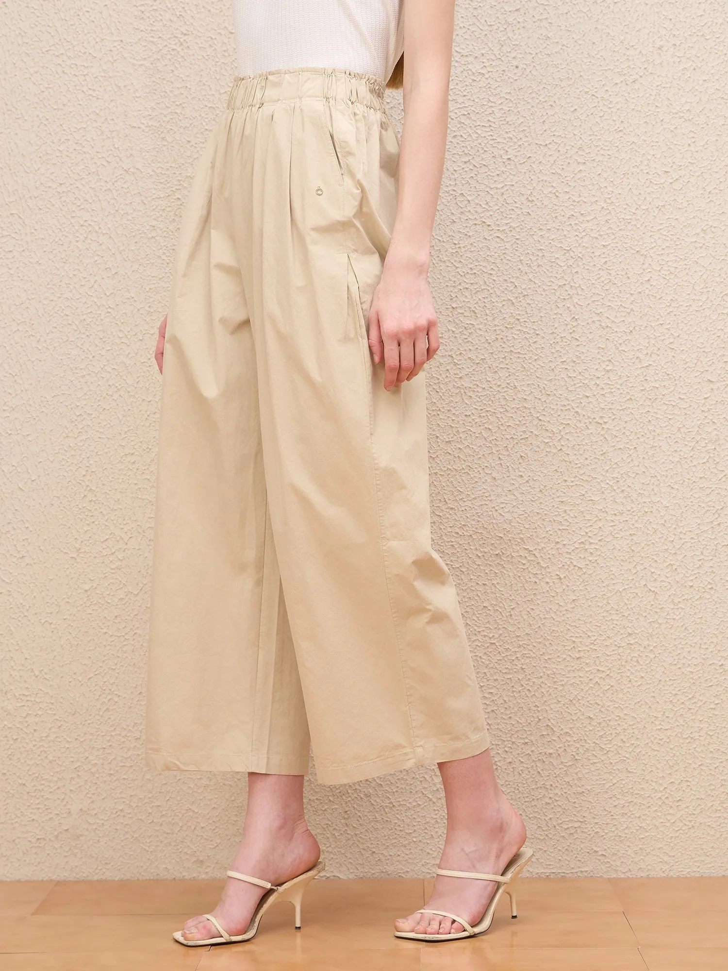 Iconic Women Beige Baggy Fit Solid Trouser