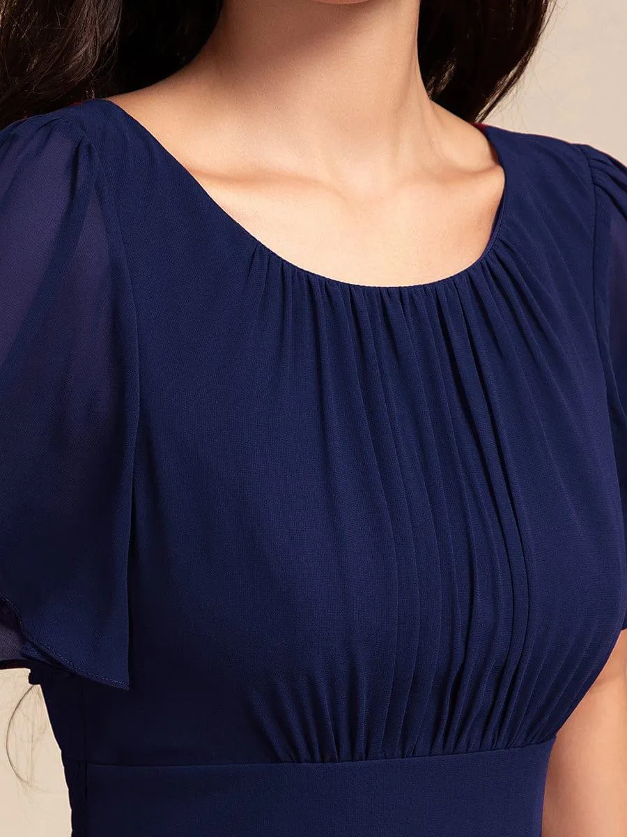 Robe de demoiselle d'honneur élégante en mousseline de soie à col rond et manches courtes