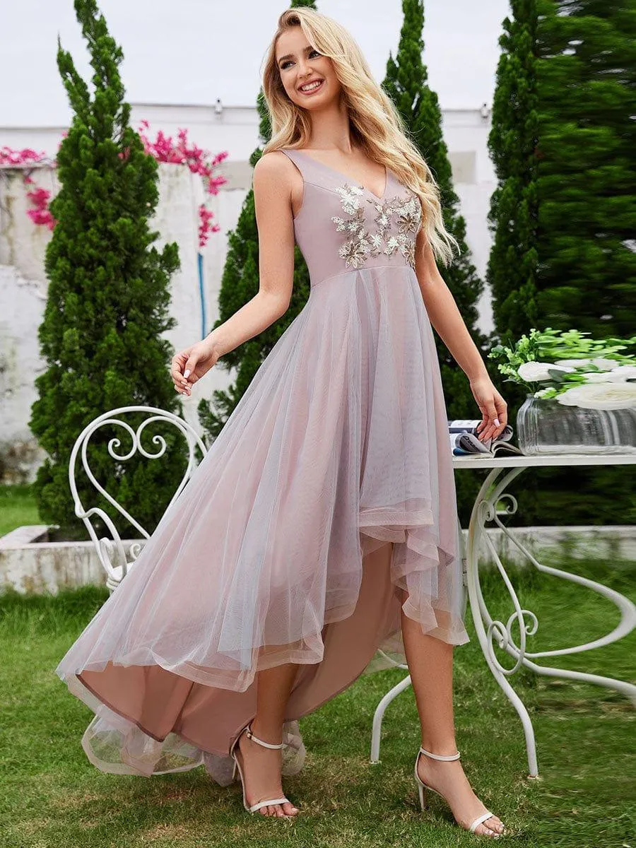 Robe de soirée en tulle avec appliques brodées sans manches col en V coupe haute et basse