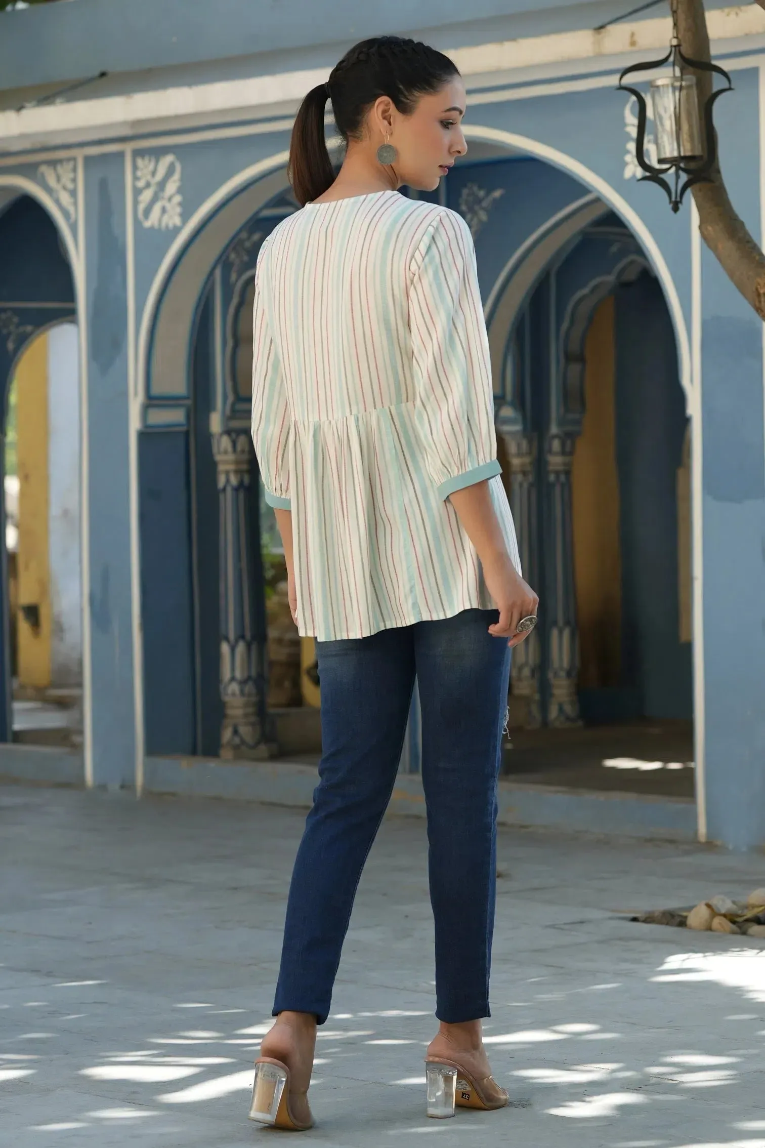 Women Ivory Rayon Staple Striped Printed Peplum Tunic.